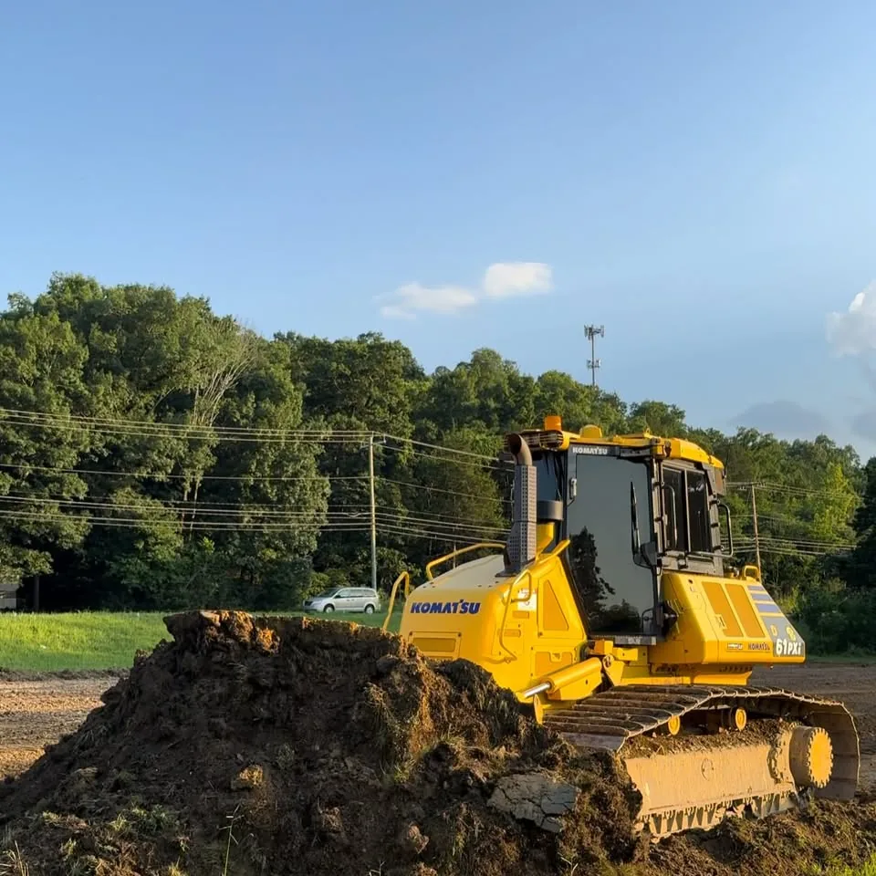 Gartman Earthworx dozer grading a site at golden hour